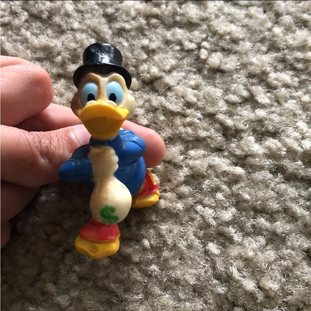 Vintage Disney action figures - daffy, minnie, and goofy